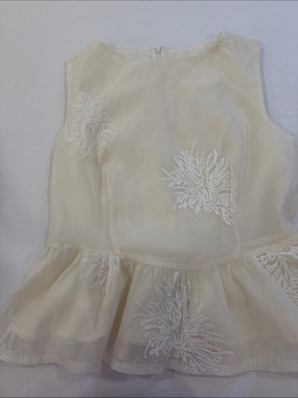 Elegant Cream Embroidered Peplum Ladies Top